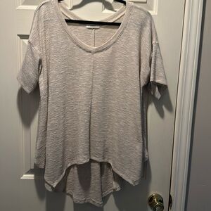EUC Cherish asymmetrical oatmeal colored top Size M